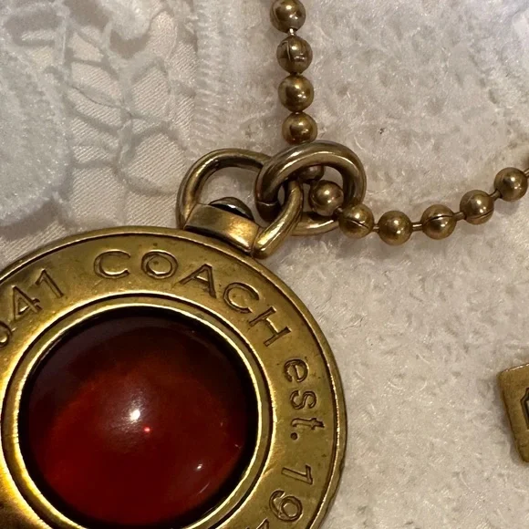 Coach Logo Pendant In Gold Tone with Amber Glass Center on Gold Tone Chain - Picture 14 of 16